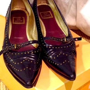 Black pointed studded shoes